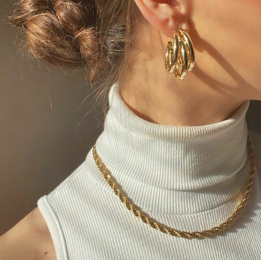 Twisted triple layered hoops