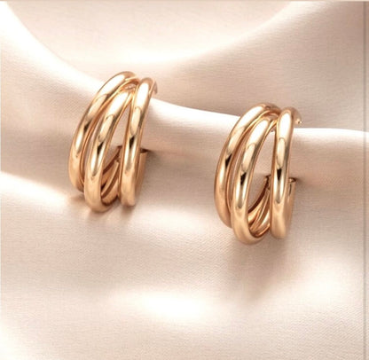 Twisted triple layered hoops