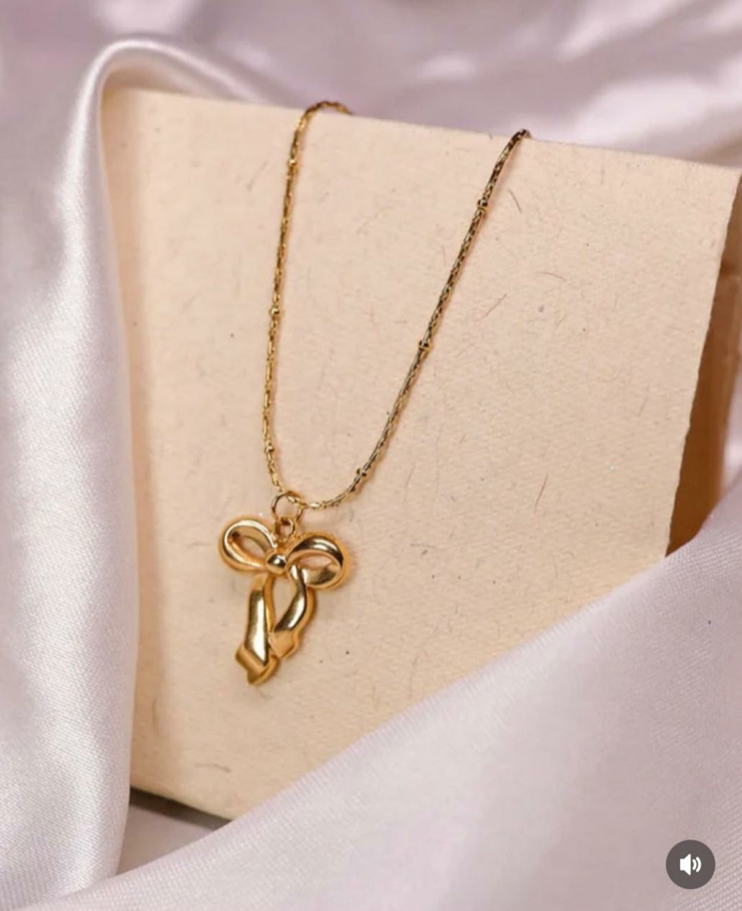 Infinity bow necklace