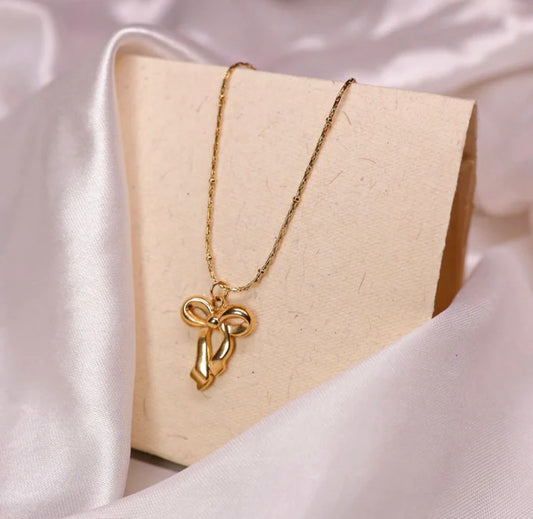 Infinity bow charm necklace